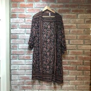 Black, peach, and burnt orange kimono.